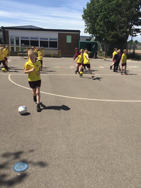 Image of Year 3 practise their ball skills